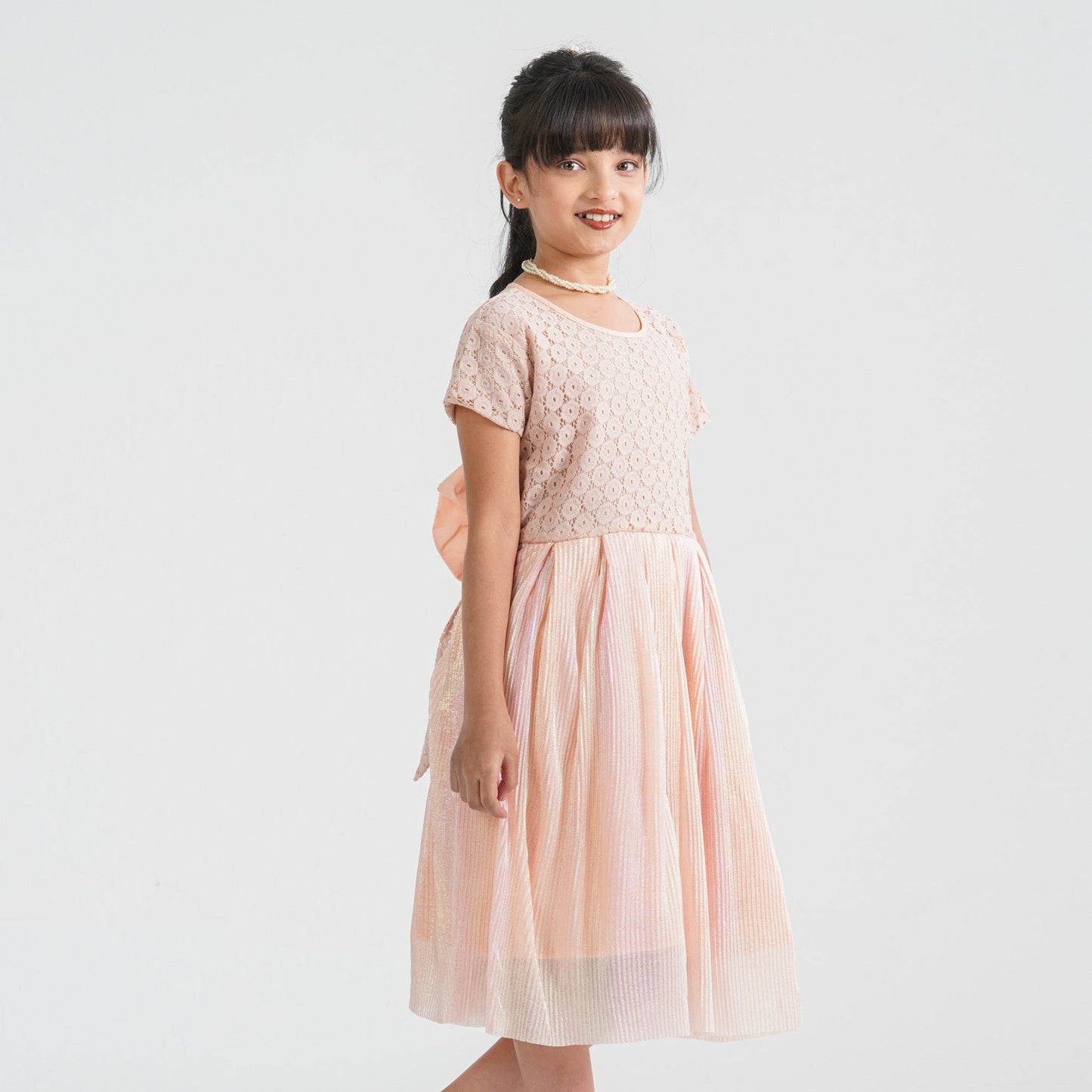 Girl’s Peach Pleated Gown