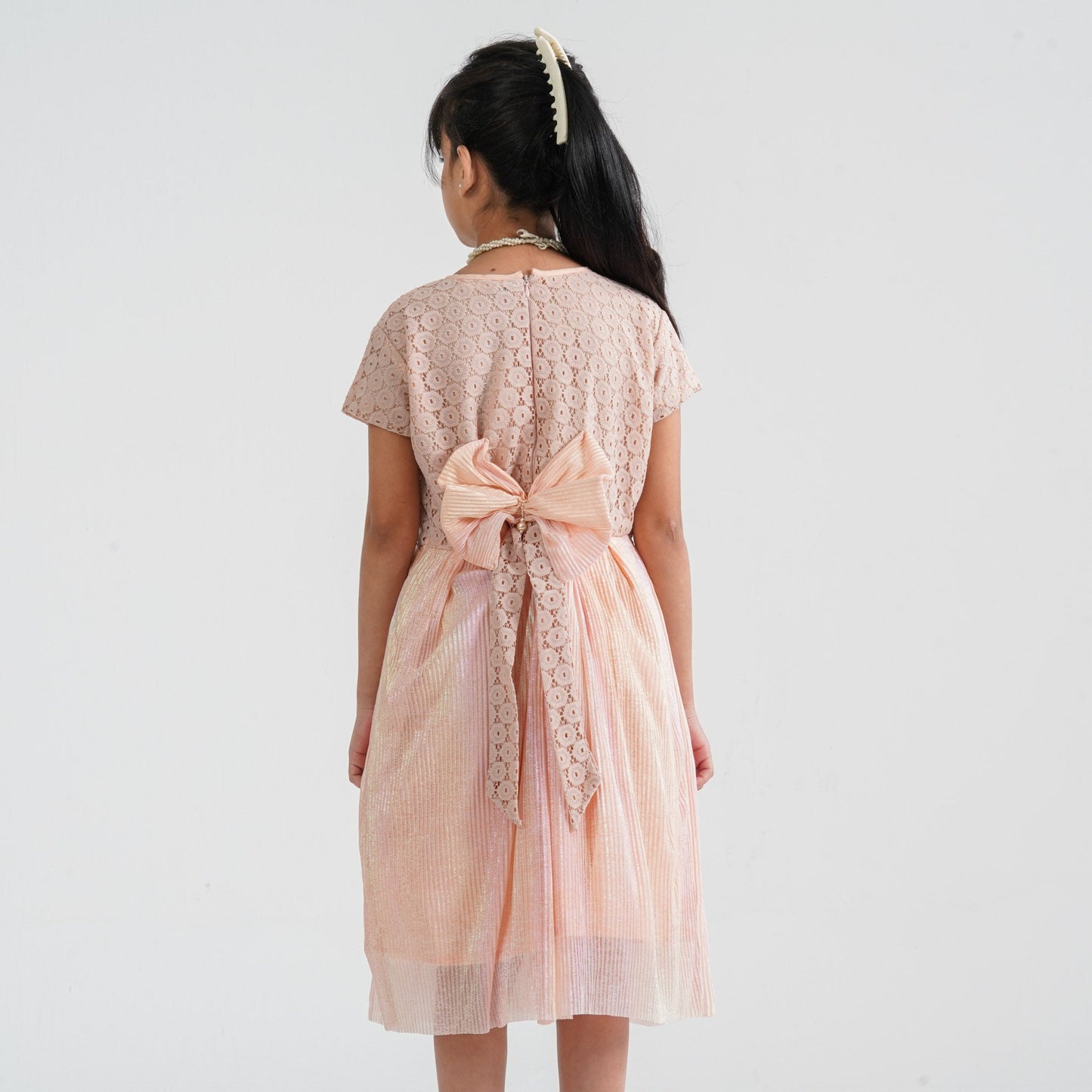 Girl’s Peach Pleated Gown
