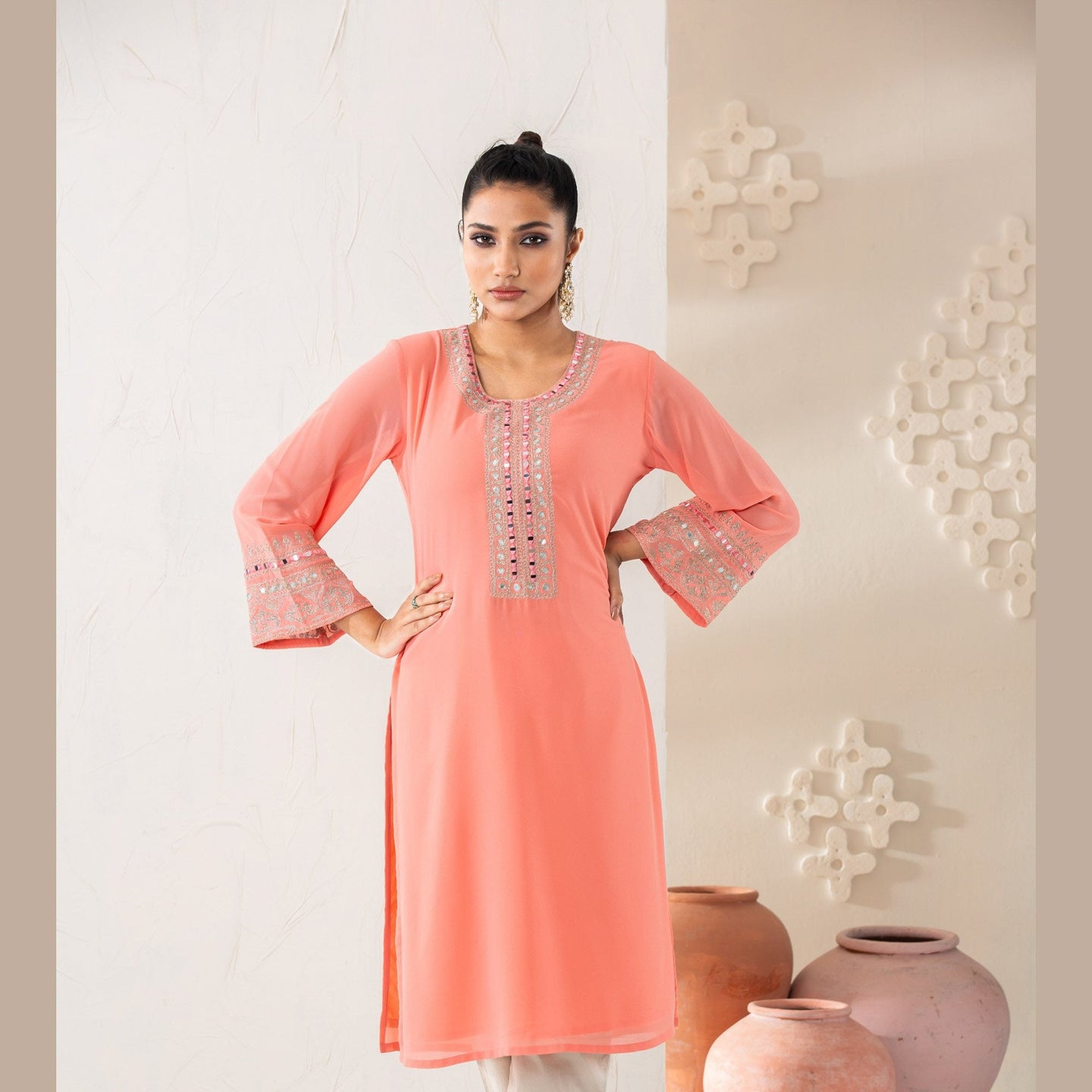 Women Peach Embroidered Kurti